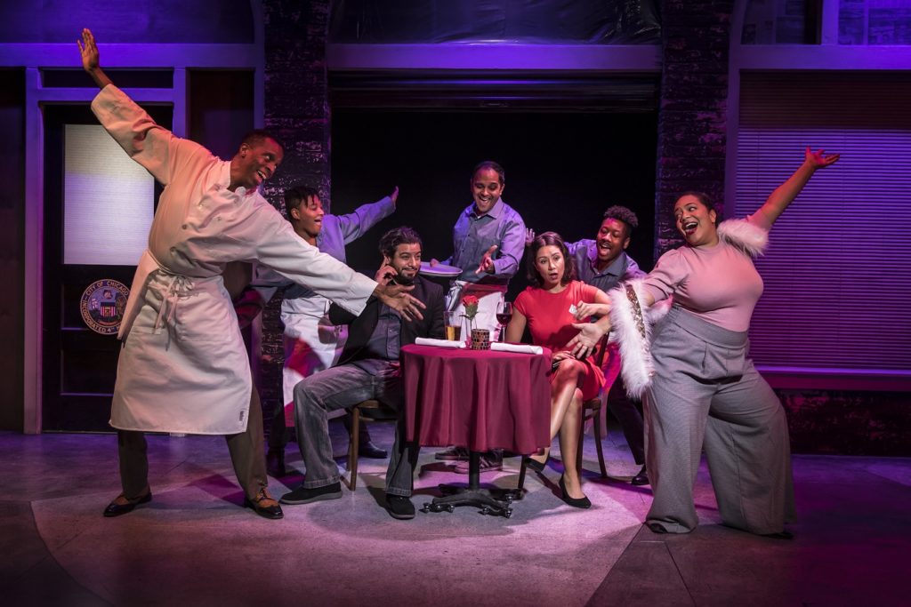 Robert Cornelius, LaKecia, Anish Jethmalani, Jerome Beck, and Sasha Smith posed around the table where Eddie Martinez and Monica Orozco are seated